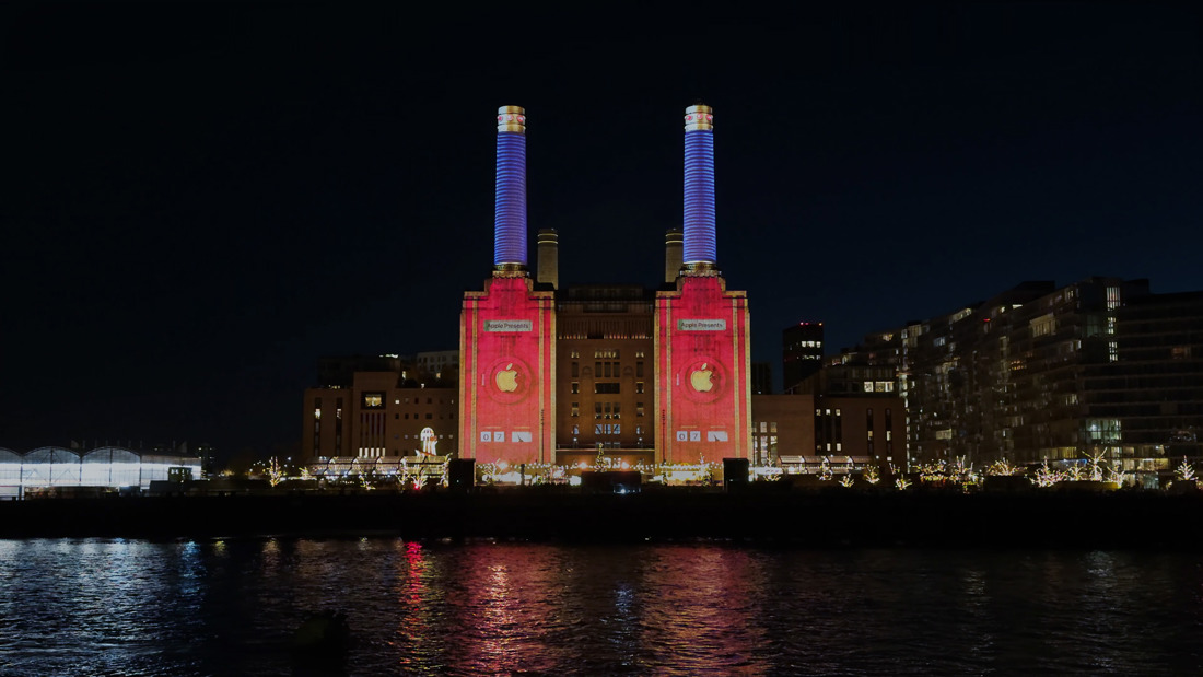The curtains projected onto the front of Battersea Power Station